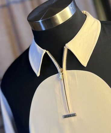 Zip and collar hardware detail
